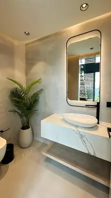 a bathroom with a sink and a mirror at Beykoz Breeze in Beykoz