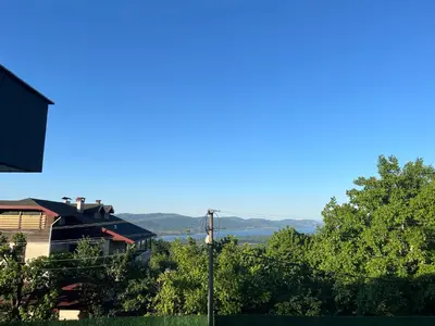 a view of a house with trees and a street light at Havuzlu Villa-Kartepe in Masukiye