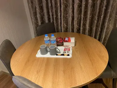 a table with a tray with water and drinks on it at Low Price Luxury Apartment Perfect for An Amazing stay In ISTANBUL in Istanbul