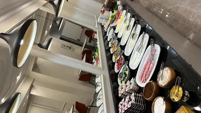 an open refrigerator filled with lots of food at Espoir HOTEL in Istanbul