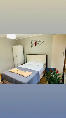 a bedroom with two beds in a room at Yaman suit in Istanbul