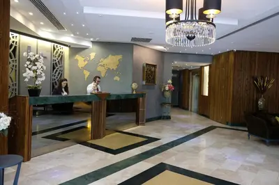 a lobby of a hotel with a reception desk at Royal Capital Hotel Bursa in Bursa