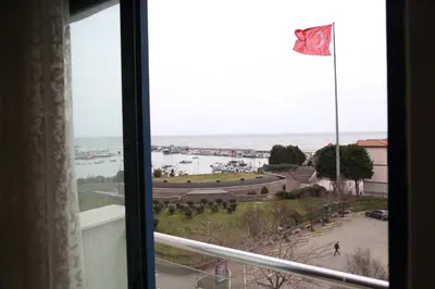 a window with a view of a body of water at Asım ve nurhan kocabıyık öğretmenevi in Avcılar