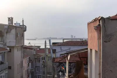 a view of a city with buildings at Soft and Historic 3BR Home w Iconic Haydarpasa View in Istanbul