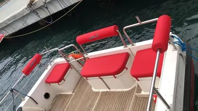 a boat with red seats on the water at Vip Bosphorus Tour in Istanbul