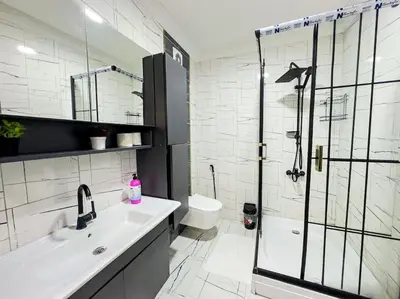 a bathroom with a shower and a sink and a toilet at Sisli Apartments Holiday441 in Istanbul