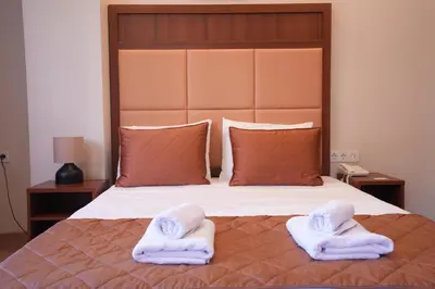 a bedroom with a bed with towels on it at Keeper in Istanbul