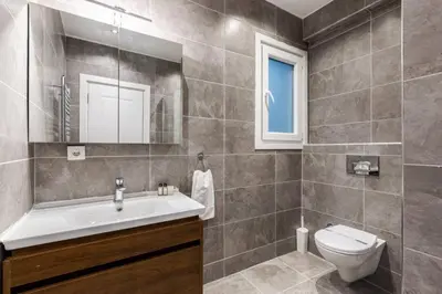 a bathroom with a sink and a toilet and a tub at Bright Charming Modern 3BD2Bath Balcony! #367 in Istanbul