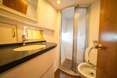 a bathroom with a sink and a shower and a toilet at Luxury Yachts Istanbul in Istanbul