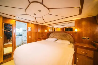 a bedroom with a large bed in a boat at Luxury Yachts Istanbul in Istanbul