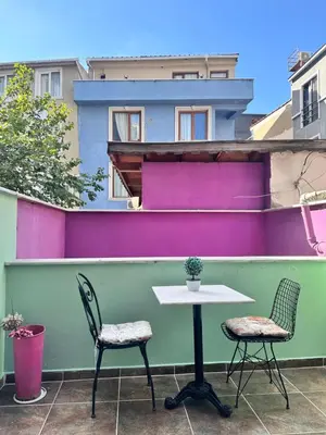 a table and two chairs sitting on a patio at Taksim Castle Suites in Istanbul