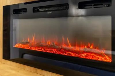 a stove with a fire inside of it at Beys Hotel Suites in Istanbul