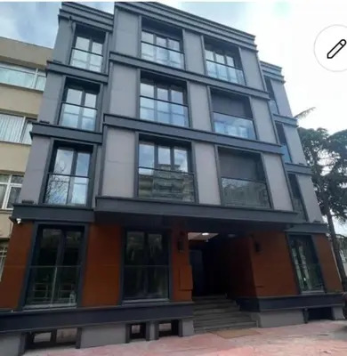 a large building with a lot of windows at Modern Two-Bedroom Flat with Stunning Bosphorus View in Istanbul