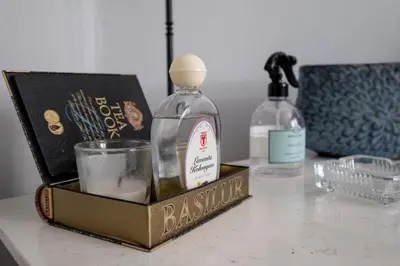a box of perfume and a bottle on a counter at Spacious Dublex in Cihangir in Istanbul