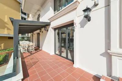 an internal courtyard of a building with a patio at Hanna Hotel in Istanbul