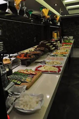 a buffet line with many different types of food at Royal Hotel Inegol in Inegol