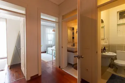 a bathroom with a toilet and a sink at Tasteful & Spacious 3BR Haven in Trendy Şişli in Istanbul