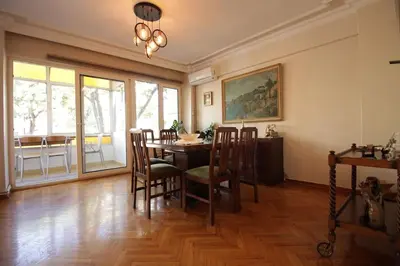 a dining room with a table and chairs at Bright Cozy Stacked Home Ideally Located n Kadikoy in Istanbul