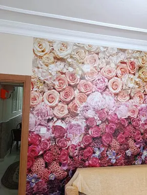 a wall covered in pink and white roses at Merkez İstanbul in Istanbul