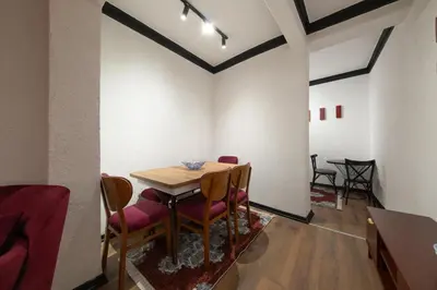 a dining room with a table and chairs at Hexa Apartments Sisli in Istanbul