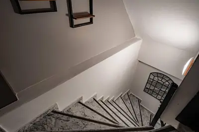 an overhead view of a staircase with a stair case at Spacious and Stylish 3BR w Private Garden in Istanbul