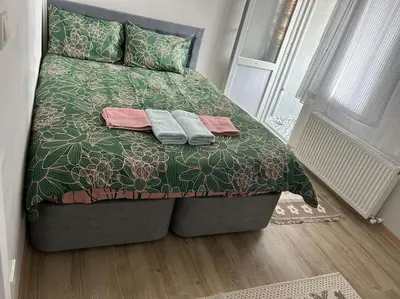a bed with two towels on it in a bedroom at Üsküdar - Venüs home - Sakin Konaklama in Istanbul