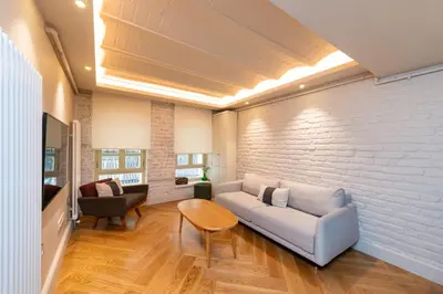 a living room with a couch and a table at Liberty Residence in Istanbul