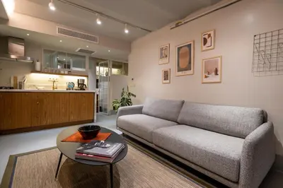 a living room with a couch and a table at Liberty Residence in Istanbul