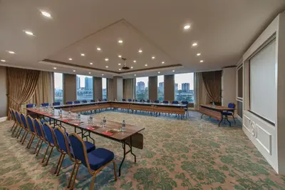 a conference room with a long table and chairs at Kaya İstanbul Fair & Convention in Istanbul