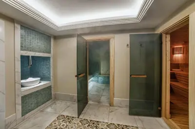 a bathroom with a shower and a sink at Kaya İstanbul Fair & Convention in Istanbul
