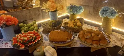 a table topped with baskets of fruits and vegetables at Park by Clover Nişantaşı Harbiye Şişli in Istanbul