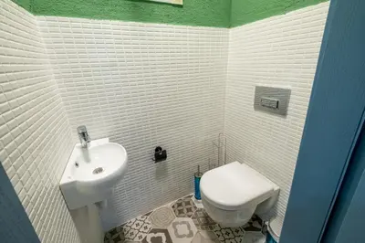 a bathroom with a sink and a toilet at Mayer Beyoglu Apartments in Istanbul