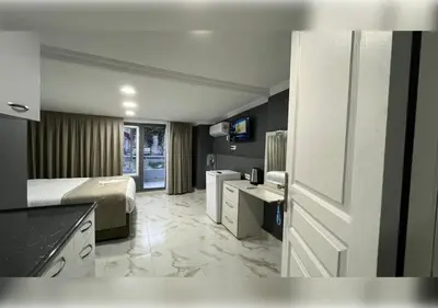 a hotel room with a bed and a bathroom at Anka Boutique Hotel in Istanbul