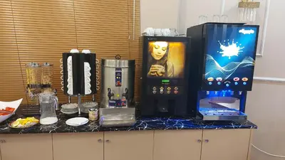 a kitchen with a counter with a machine on it at Hamit Hotel Istanbul - Special Category in Istanbul