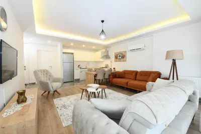 a living room with a couch and a table at Perihan Apartments in Istanbul