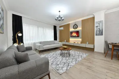 a living room with a couch and a table at VIP Apartment in Istanbul
