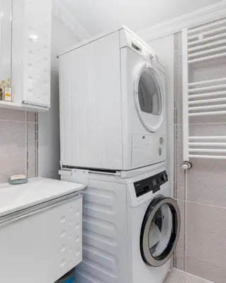 a washing machine and a washer in a bathroom at Uludag Tatil Evleri & Villa Dogus Uludağ in Bursa