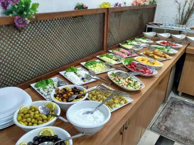 a buffet line with many different types of food at Maritime Boutique Hotel in Istanbul