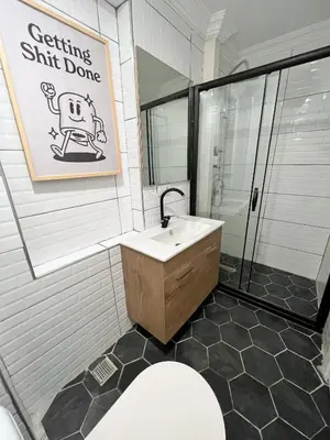 a bathroom with a sink and a shower and a toilet at Central 5 Bedroom 5 Bathroom, Newly Renovated Villa at the heart of the city in Istanbul