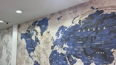 a mural of a map on a wall at Rozza Hotel in Istanbul