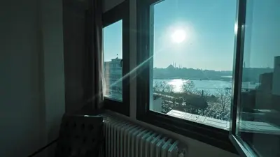 a window in a room with a view of the water at Astounding Sea View Apartment in Karaköy 4BR, 2BA in Istanbul