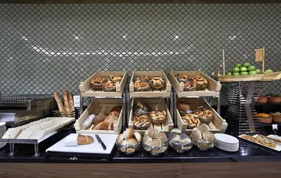a buffet with many different types of bread and pastries at Uranus Istanbul Topkapi in Istanbul