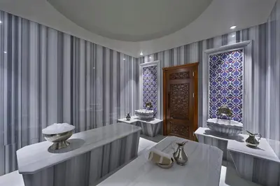 a bathroom with two sinks and a window at Uranus Istanbul Topkapi in Istanbul