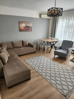 a living room with a couch and a table at KADIKOY merkezi konumda in Istanbul