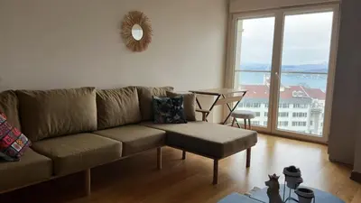 a living room with a couch and a table at Luxury Unit with Sea View Taksim Square in Istanbul