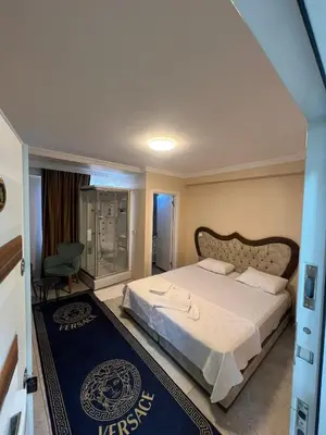a bedroom with a king sized bed in a room at The walens hotel in Istanbul