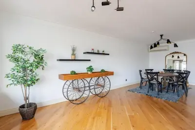 a dining room with a table and a bicycle in a room at Luxury Modern 3Bed25Bath Central Bright Pad #375 in Istanbul