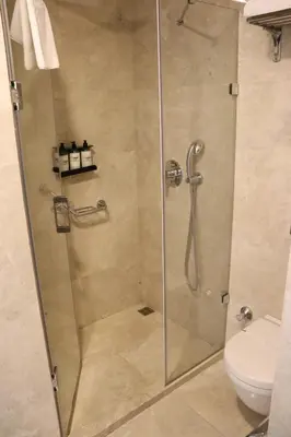 a shower stall in a bathroom with a toilet at Riva Hotel Taksim in Istanbul