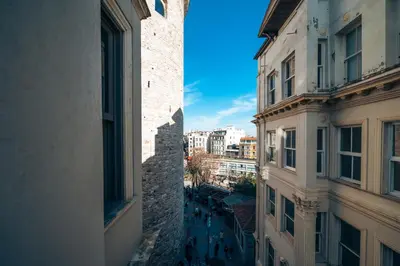 a view of a city from a window of a building at Galata Guest Teori in Istanbul