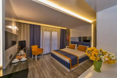a hotel room with a bed and a desk at Inntel Hotel Istanbul in Istanbul